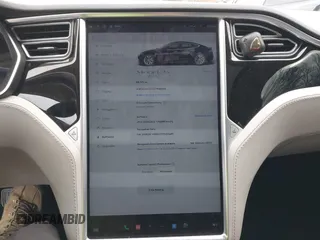 2014 Tesla Model S 60 with VIN 5YJSA1S12EFP42605, listed as a IAAI auction lot 40905031 with 68,155 mi miles and . Bid and sale history available at DreamBid. Image 18.