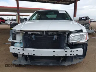2014 Chrysler 300 z VIN 2C3CCAAG3EH380027, wystawiony jako IAAI lot #42191831 z przebiegiem 137 751 mil mil oraz . Historia ofert i sprzedaży dostępna na DreamBid. Obrazek 13.