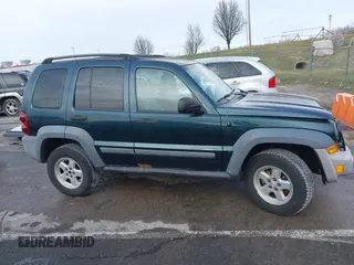 2005 Jeep Liberty Sport with VIN 1J4GL48K15W631101, listed as a IAAI auction lot 41217588 with 168,378 mi miles. Bid and sale history available at carsss.com. Image 13.
