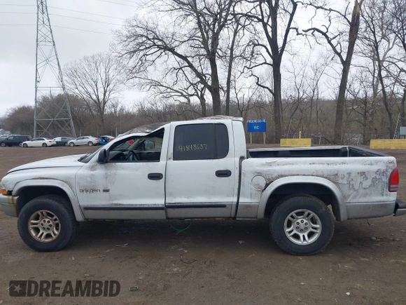 2002 Dodge Dakota SLT z VIN 1B7HG48N72S577296, wystawiony jako IAAI lot #41848637 z przebiegiem 133 777 mil mil oraz . Historia ofert i sprzedaży dostępna na DreamBid. Obrazek 13.