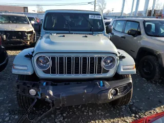 2024 Jeep Wrangler Sahara z VIN 1C4RJXP68RW128360, wystawiony jako Copart lot #84001304 z przebiegiem 17 036 mil mil oraz Szkoda całkowita • Salvage title. Historia ofert i sprzedaży dostępna na DreamBid. Obrazek 5.
