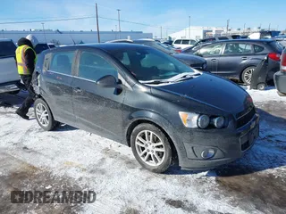 2013 Chevrolet Sonic LT with VIN 1G1JC6SG1D4250167, listed as a IAAI auction lot 41498238 with 66,750 mi miles. Bid and sale history available at carsss.com. Image 1.
