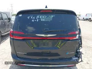 2023 Chrysler Pacifica Hybrid Touring L with VIN 2C4RC1L75PR592251, listed as a IAAI auction lot 42037873 with 44,428 mi miles and . Bid and sale history available at DreamBid. Image 16.