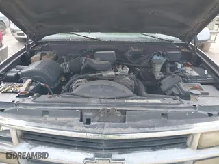 1997 Chevrolet Tahoe with VIN 1GNEK13R8VJ329165, listed as a IAAI auction lot 41631672 with 166,976 mi miles. Bid and sale history available at carsss.com. Image 10.