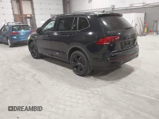 2024 Volkswagen Tiguan SE R-Line Black with VIN 3VV8B7AX8RM103700, listed as a IAAI auction lot 41991238 with 5,084 mi miles and . Bid and sale history available at DreamBid. Image 3.