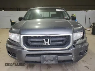 2011 Honda Ridgeline RT z VIN 5FPYK1F26BB007946, wystawiony jako Copart lot #87338354 z przebiegiem 113 367 mil mil oraz Szkoda całkowita • Salvage title. Historia ofert i sprzedaży dostępna na DreamBid. Obrazek 5.