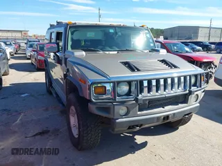 2003 Hummer H2 with VIN 5GRGN23U83H112964, listed as a IAAI auction lot 41328902 with 156,994 mi miles. Bid and sale history available at carsss.com. Image 1.