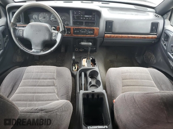 1998 Jeep Grand Cherokee Laredo with VIN 1J4GZ58S6WC137968, listed as a Copart auction lot 84083454 with 0 mi miles and Non Repairable. Bid and sale history available at carsss.com. Image 8.