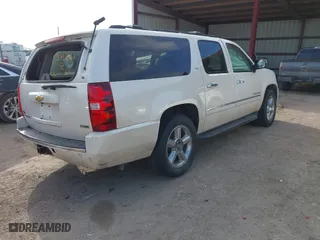 2012 Chevrolet Suburban LTZ with VIN 1GNSKKE71CR251475, listed as a IAAI auction lot 41276204 with 241,316 mi miles. Bid and sale history available at carsss.com. Image 4.
