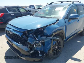 2023 Toyota RAV4 Hybrid SE with VIN 4T3T6RFV6PU130213, listed as a IAAI auction lot 42066860 with Not provided miles and . Bid and sale history available at DreamBid. Image 6.