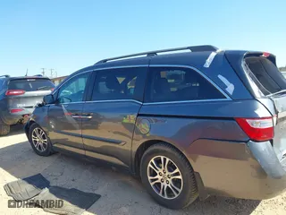 2012 Honda Odyssey EX-L with VIN 5FNRL5H64CB066240, listed as a IAAI auction lot 41792321 with 186,895 mi miles. Bid and sale history available at carsss.com. Image 13.
