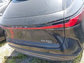 2023 Lexus RX 350 z VIN 2T2BAMCA3PC015704, wystawiony jako IAAI lot #41728927 z przebiegiem 23 356 mil mil oraz . Historia ofert i sprzedaży dostępna na DreamBid. Obrazek 16.