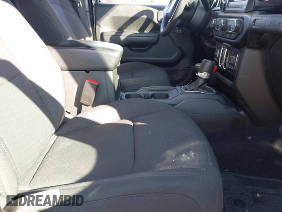 2023 Jeep Wrangler Sport S with VIN 1C4HJXDN6PW617814, listed as a IAAI auction lot 41810646 with 25,095 mi miles and . Bid and sale history available at DreamBid. Image 5.