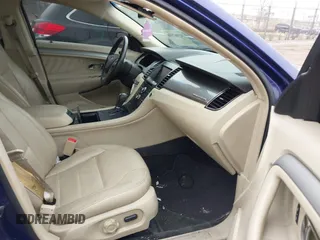 2014 Ford Taurus SEL with VIN 1FAHP2E80EG106719, listed as a IAAI auction lot 41967594 with 194,426 mi miles and . Bid and sale history available at DreamBid. Image 5.