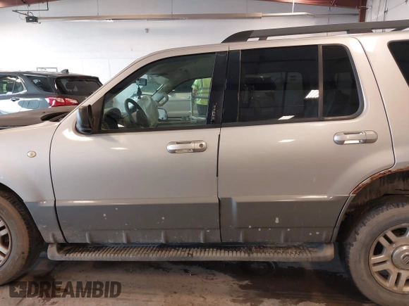 2005 Mercury Mountaineer Convenience z VIN 4M2ZU86E35UJ14209, wystawiony jako IAAI lot #42172836 z przebiegiem 216 964 mil mil oraz . Historia ofert i sprzedaży dostępna na DreamBid. Obrazek 14.