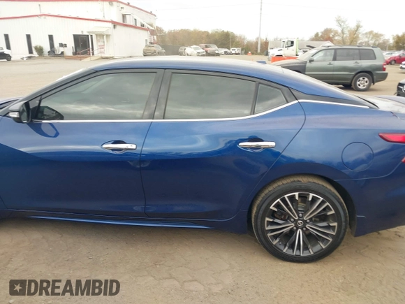 2016 Nissan Maxima Platinum z VIN 1N4AA6AP4GC414364, wystawiony jako IAAI lot #40738491 z przebiegiem 97 889 mil mil oraz . Historia ofert i sprzedaży dostępna na DreamBid. Obrazek 14.