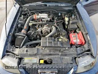 2001 Ford Mustang GT Deluxe z VIN 1FAFP42X41F139883, wystawiony jako Copart lot #50243745 z przebiegiem 142 545 mil mil oraz Szkoda całkowita • Salvage title. Historia ofert i sprzedaży dostępna na DreamBid. Obrazek 11.