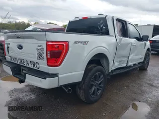 2023 Ford F-150 XL with VIN 1FTFW1ED8PFD06493, listed as a IAAI auction lot 42002427 with 31,147 mi miles and . Bid and sale history available at carsss.com. Image 4.
