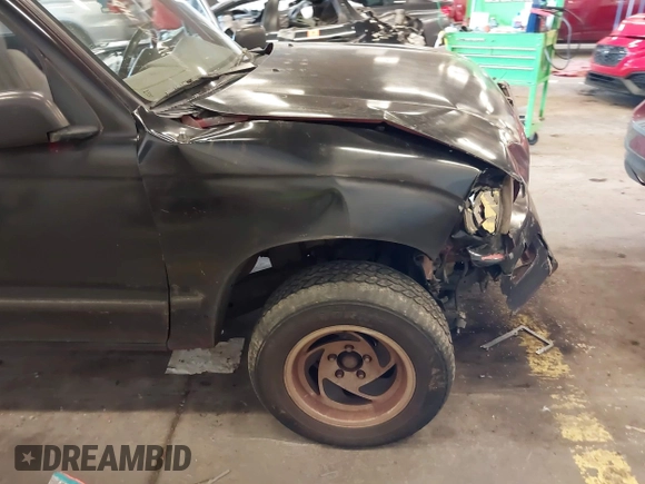 1998 Toyota Tacoma with VIN 4TANL42N4WZ030101, listed as a IAAI auction lot 41735767 with 247,387 mi miles. Bid and sale history available at carsss.com. Image 21.