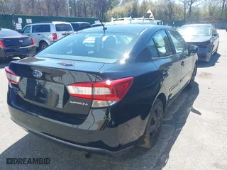 2019 Subaru Impreza with VIN 4S3GKAA66K3624212, listed as a IAAI auction lot 42070474 with 112,951 mi miles. Bid and sale history available at carsss.com. Image 4.