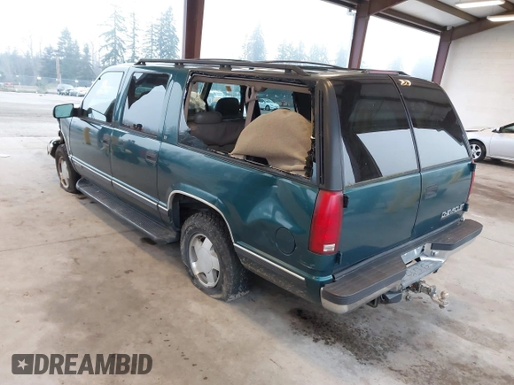 1997 Chevrolet Suburban with VIN 3GNFK16R6VG118242, listed as a IAAI auction lot 41349416 with 183,439 mi miles. Bid and sale history available at carsss.com. Image 3.