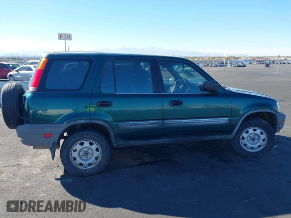 1999 Honda CR-V LX with VIN JHLRD1847XC031475, listed as a IAAI auction lot 41606369 with 254,445 mi miles. Bid and sale history available at carsss.com. Image 12.