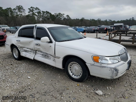 2001 Lincoln Town Car Executive with VIN 1LNHM81W91Y650775, listed as a Copart auction lot 47074385 with 141,344 mi miles and Salvage Title. Bid and sale history available at carsss.com. Image 4.