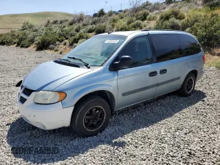 2005 Dodge Caravan SE with VIN 1D4GP24RX5B384267, listed as a Copart auction lot 59364325 with 242,604 mi miles and Salvage title. Bid and sale history available at DreamBid. Image 1.