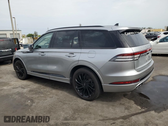 2023 Lincoln Aviator Reserve z VIN 5LM5J7WCXPGL20322, wystawiony jako Copart lot #58003605 z przebiegiem 14 563 mil mil oraz Szkoda całkowita • Salvage title. Historia ofert i sprzedaży dostępna na DreamBid. Obrazek 2.