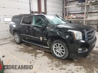 2015 GMC Yukon XL SLT with VIN 1GKS2HKC9FR175011, listed as a IAAI auction lot 41510519 with 194,136 mi miles. Bid and sale history available at carsss.com. Image 1.