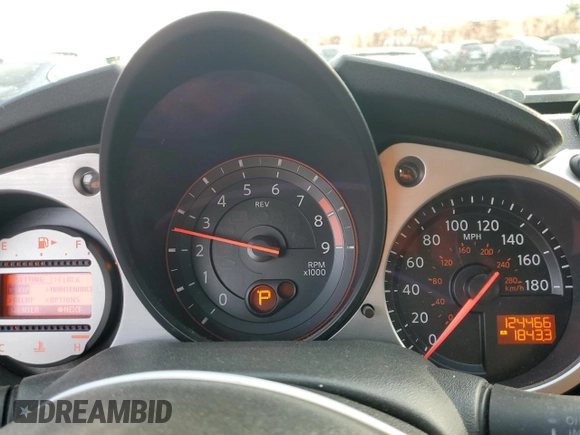 2011 Nissan 370Z Touring with VIN JN1AZ4EH6BM550267, listed as a Copart auction lot 82245804 with 124,466 mi miles and Salvage Title. Bid and sale history available at carsss.com. Image 9.