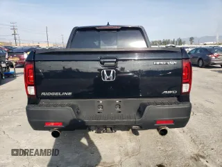 2023 Honda Ridgeline RTL with VIN 5FPYK3F52PB023574, listed as a Copart auction lot 44419565 with 15,205 mi miles and Salvage title. Bid and sale history available at DreamBid. Image 6.
