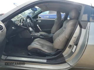 2003 Nissan 350Z Touring z VIN JN1AZ34E23T003943, wystawiony jako Copart lot #55221405 z przebiegiem 198 292 mil mil oraz Szkoda całkowita • Salvage title. Historia ofert i sprzedaży dostępna na DreamBid. Obrazek 7.