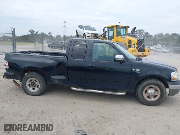 2000 Ford F-150 XL with VIN 1FTRX07W9YKB27455, listed as a IAAI auction lot 42197973 with 211,160 mi miles and . Bid and sale history available at DreamBid. Image 13.