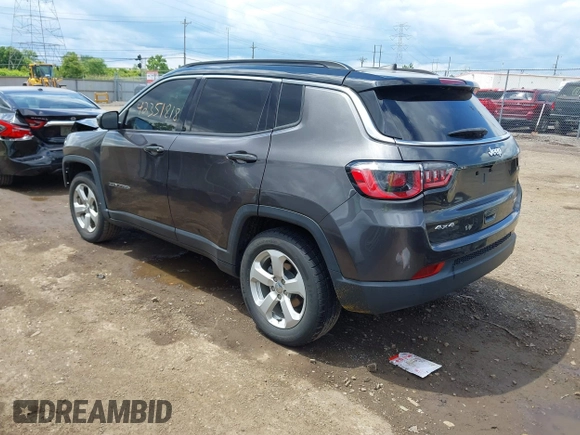 2018 Jeep Compass Latitude with VIN 3C4NJDBB5JT355582, listed as a IAAI auction lot 42351818 with 75,324 mi miles and . Bid and sale history available at DreamBid. Image 3.
