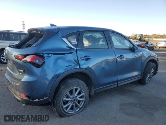 2023 Mazda CX-5 2.5 S with VIN JM3KFBAM5P0228761, listed as a Copart auction lot 42827995 with 0 mi miles and Salvage Title. Bid and sale history available at carsss.com. Image 3.