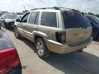 2001 Jeep Grand Cherokee Limited with VIN 1J4GW58N51C575036, listed as a IAAI auction lot 42573849 with 223,757 mi miles and . Bid and sale history available at DreamBid. Image 3.