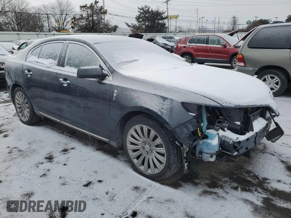 2014 Lincoln MKS with VIN 1LNHL9EK0EG602349, listed as a Copart auction lot 45211525 with 51,616 mi miles and Salvage Title. Bid and sale history available at DreamBid. Image 4.
