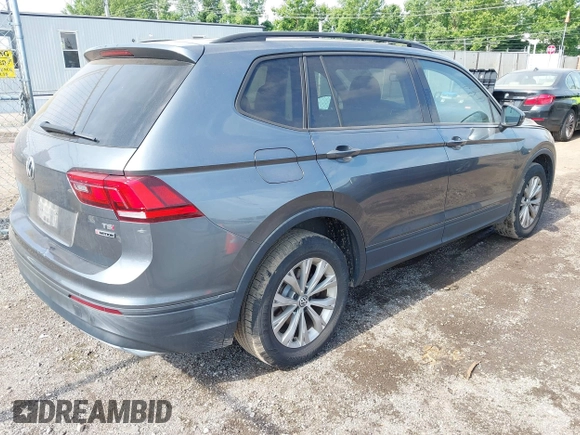 2018 Volkswagen Tiguan S with VIN 3VV0B7AX5JM108306, listed as a IAAI auction lot 42741783 with 71,040 mi miles and . Bid and sale history available at DreamBid. Image 4.