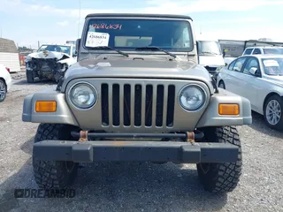 2004 Jeep Wrangler Sport with VIN 1J4FA49SX4P774167, listed as a IAAI auction lot 42686834 with 170,731 mi miles and . Bid and sale history available at DreamBid. Image 6.