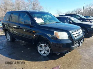 2007 Honda Pilot LX with VIN 5FNYF18187B018956, listed as a IAAI auction lot 41661710 with 228,447 mi miles and . Bid and sale history available at carsss.com. Image 1.
