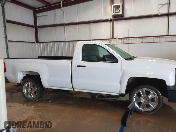 2014 Chevrolet Silverado 1500 Work Truck with VIN 1GCNKPEH5EZ266821, listed as a IAAI auction lot 41570036 with 125,916 mi miles and . Bid and sale history available at DreamBid. Image 14.