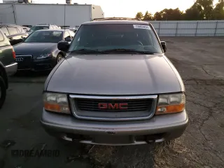 2000 GMC Jimmy SLE Convenience with VIN 1GKDT13WXY2158025, listed as a Copart auction lot 73565954 with 0 mi miles and Salvage Title. Bid and sale history available at carsss.com. Image 5.