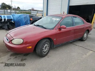 1999 Mercury Sable z VIN 1MEFM50S2XG636352, wystawiony jako Copart lot #52138465 z przebiegiem 178 424 mil mil oraz Tytuł czysty. Historia ofert i sprzedaży dostępna na DreamBid. Obrazek 1.
