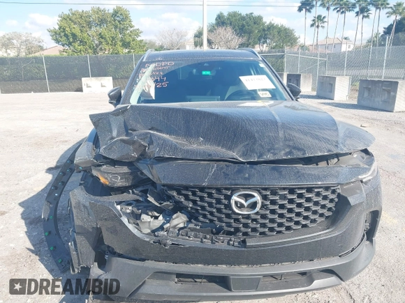 2023 Mazda CX-50 S Premium Plus with VIN 7MMVABEM1PN141344, listed as a IAAI auction lot 41473823 with 12,120 mi miles and . Bid and sale history available at DreamBid. Image 6.