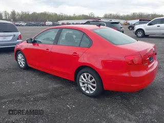 2011 Volkswagen Jetta Sedan SE w/Convenience & Sunroof PZEV with VIN 3VWDZ7AJ0BM061238, listed as a IAAI auction lot 42046655 with 174,131 mi miles. Bid and sale history available at carsss.com. Image 3.
