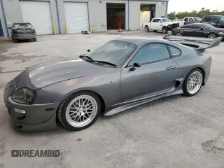 1996 Toyota Supra с VIN JZA800034162, выставлен на аукционе Copart как лот 80046394 с пробегом 86 285 миль миль и Чистый • Clean title. История ставок и продаж доступна на DreamBid. Изображение 1.