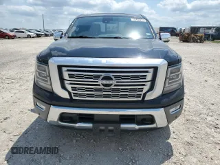2023 Nissan Titan Platinum Reserve with VIN 1N6AA1EDXPN106467, listed as a Copart auction lot 53455215 with 56,061 mi miles and Salvage title. Bid and sale history available at DreamBid. Image 5.