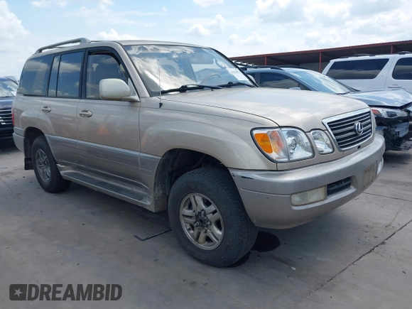2001 Lexus LX 470 with VIN JTJHT00W713511796, listed as a IAAI auction lot 42222574 with 297,427 mi miles and . Bid and sale history available at carsss.com. Image 1.