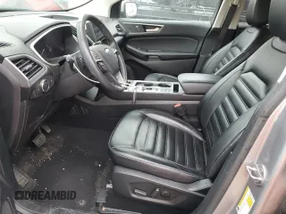 2021 Ford Edge SEL с VIN 2FMPK4J92MBA11014, выставлен на аукционе Copart как лот 61131095 с пробегом 64 316 миль миль и Списание • Salvage title. История ставок и продаж доступна на DreamBid. Изображение 7.